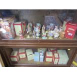 Twenty-five Beatrix Potter figures, mostly Royal Doulton Bunnykins (nine with boxes), Beswick or