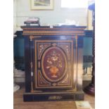 A late 19th century ebonised side cabinet, simulating pietra dura, with gilt metal mounts, the