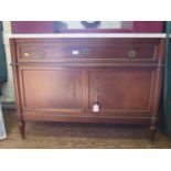 A 19th century style French commode, the marble top over a long drawer and a pair of cupboard doors,