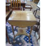An Edwardian inlaid rosewood drop leaf square table, with shaped leaves on square and turned