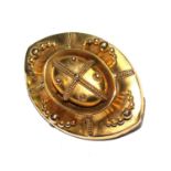 A yellow metal early Victorian brooch