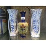 A pair of Villeroy & Boch Art Nouveau shape blue and vases, with floral decoration, 25 cm high,
