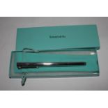 A silver Tiffany & Co. fountain pen, the clip in the form of a 'T', marked 925, cased unused