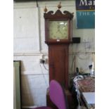 An early 19th century oak longcase clock, with ball finials over a painted dial with date