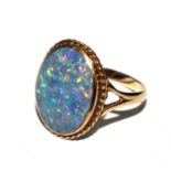 An opal ring set in 9 carat gold