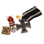 A German 2nd class Iron Cross and a miniature South African medal