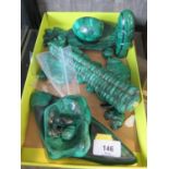 A Collection of African malachite carvings, including a model of a corn cob, eggs, ashtrays and