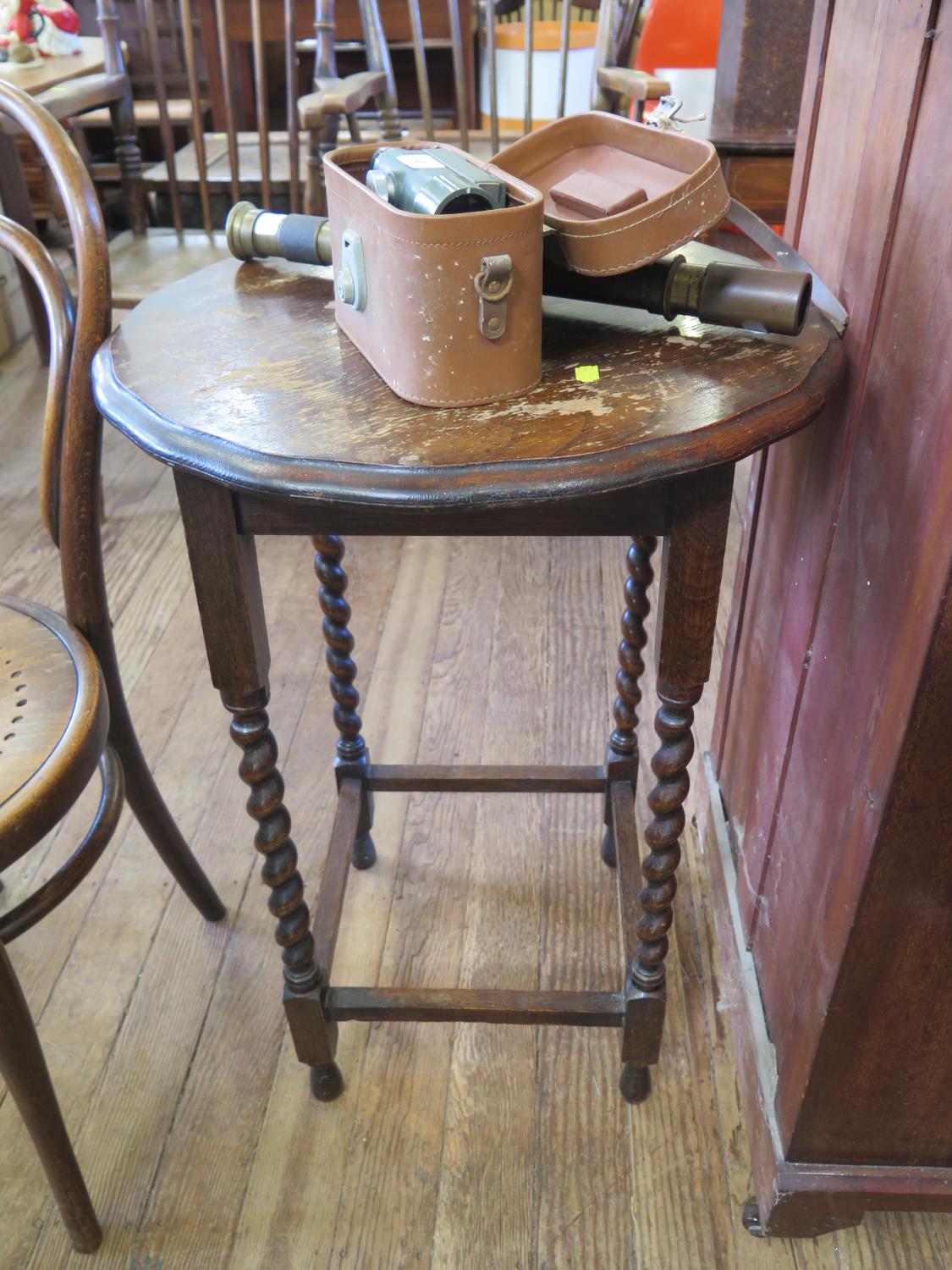 A pair of bentwood dining chairs and an oak window table with barley-twist legs (3)