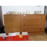 A light oak Stag Furniture chest of drawers, the three short drawers beside three long drawers on