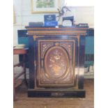 A late 19th century ebonised side cabinet, simulating pietra dura, with gilt metal mounts, the