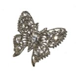 A costume jewellery butterfly brooch, set in white metal with faux diamonds