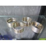 Four silver napkin rings