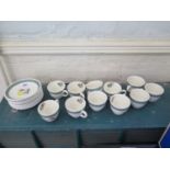 A set of eleven Crown Ducal 'Gay Meadow' pattern coffee cups and saucers, and an extra saucer