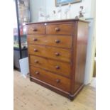 A Victorian mahogany chest of drawers, with two short and four long graduated drawers, on pad