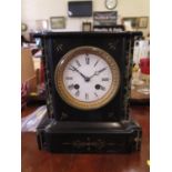 A Victorian slate and green marble mantel clock, with enamel dial, the French twin train movement