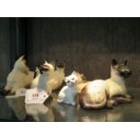 Four various Beswick figures of cats, another (marked as a second), and three Royal Doulton