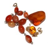 A small collection of amber to include bracelet, pendant, etc