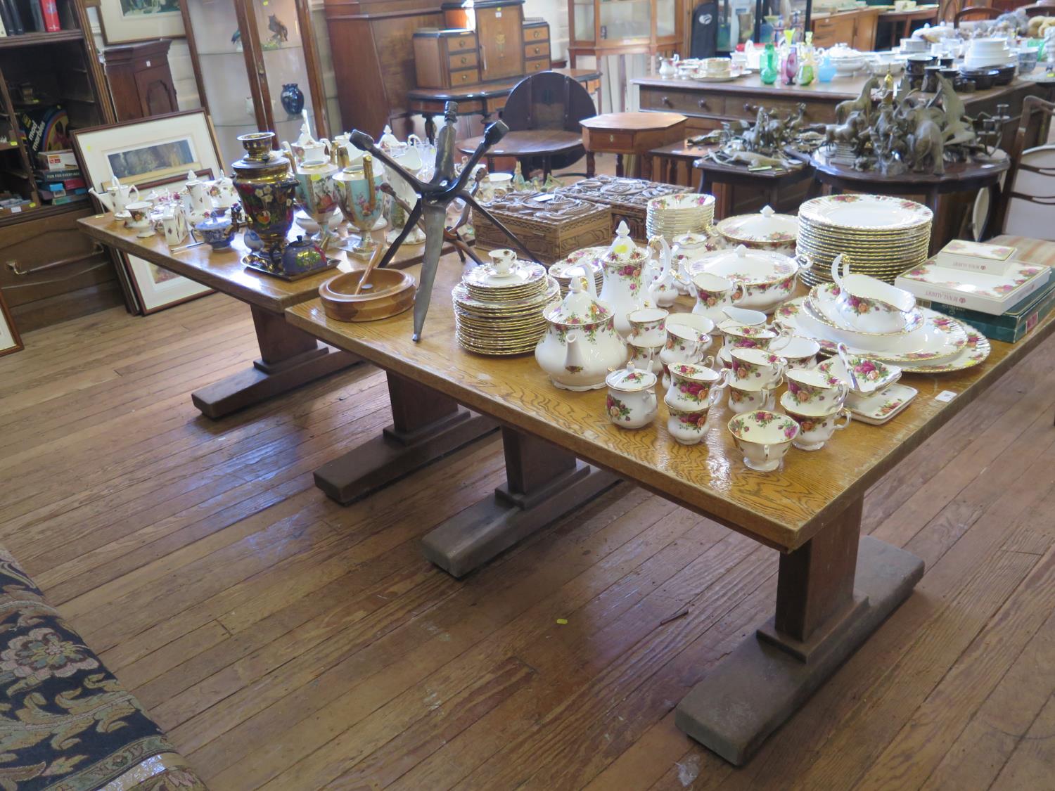 An oak refectory table, the rectangular top on a trestle base, 130 cm long, 106 cm wide, 72.5 cm