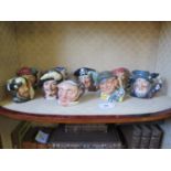 Royal Doulton medium size character jugs: The Trapper D6612, The Lumberjack D6613, Punch & Judy