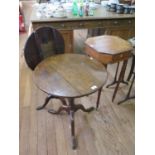 An early 19th century line inlaid fruitwood occasional table, the octagonal top with drawer over