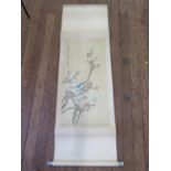 A pair of Chinese painted scrolls, each depicting exotic birds in branches, image size 84 x 41 cm (