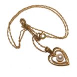 A 9 carat gold heart shape pendant set with a single cultured pearl and 9 carat fine chain in box