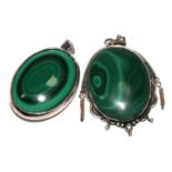 Two pieces of polished malachite set in silver colour frames