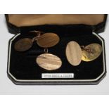 A pair of gold back and front oval cufflinks
