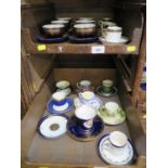 A collection of cabinet cups and saucers, including a set of six German blue and gilt, Royal Crown