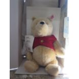 A Steiff limited edition Winnie the Pooh bear, 354908, with certificate, boxed, 26 cm long