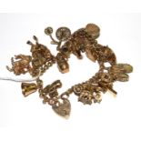A 9ct gold charm bracelet, total weight 72g