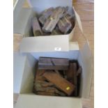 A collection of wood and moulding planes, most stamped with names, a cased micrometer, and other