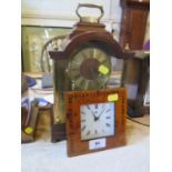 A Kundo quartz anniversary clock, 31cm high, and another quartz table clock (2)