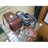 A Rolleiflex TLR DBP DBGM camera 3.5f number 2263362, with additional prism viewfinder attachment,