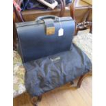 A Celine of Paris black leather briefcase, with compartments to the interior, unused and includes