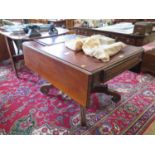 A William IV mahogany Pembroke table, with cushion moulded frieze and drawer on a square waisted