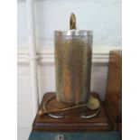 An Edwardian silver plated and brass dinner gong, of cylindrical form on a moulded base, 39 cm high