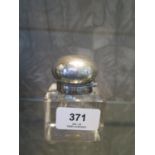 A silver mounted glass inkwell, marks rubbed