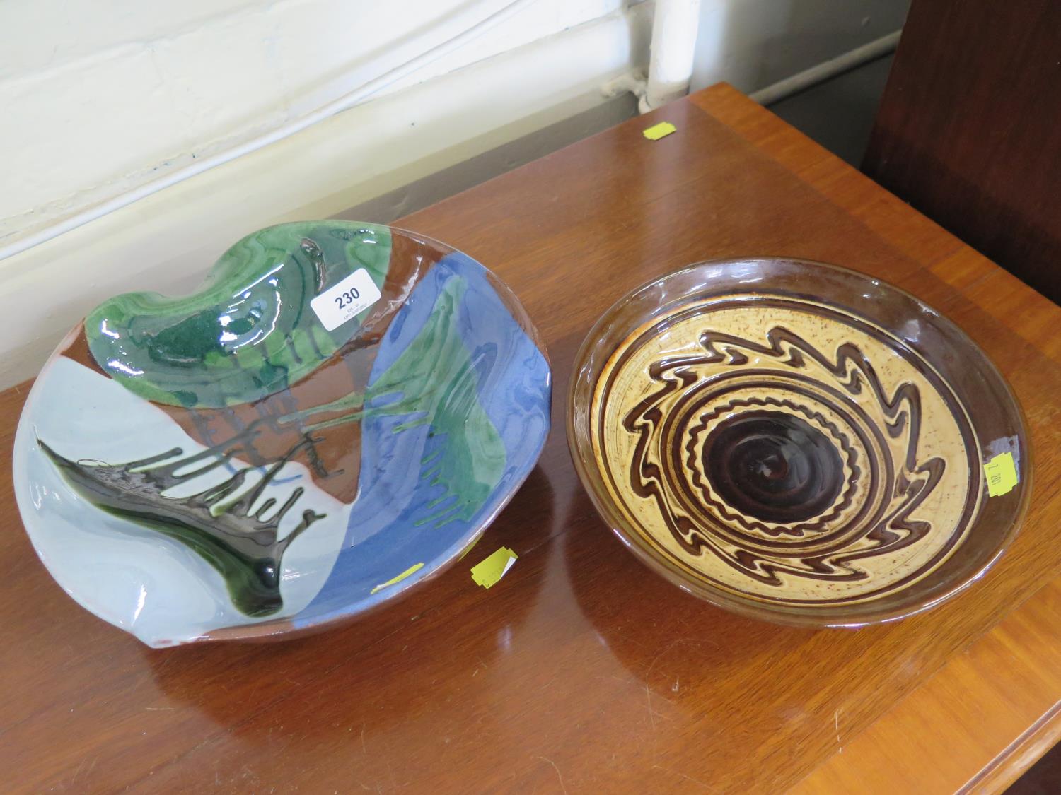 A Ramsbury Pottery traditional brown and yellow slip bowl by Peter Holdsworth (P.J.H.), circa