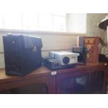 A Rollei P350AF slide projector, with case and wired control, a box of 35mm slides of the Earth from