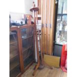 An Edwardian satinwood crossbanded mahogany hat stand, on three bracket feet, 212 cm high