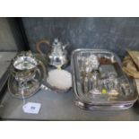 A collection of silver plate to include a pair of entrée dishes, sauce boat and tray, two shell