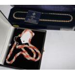A multi strand pink coral and white pearl twisted necklace with silver gilt clasp together with