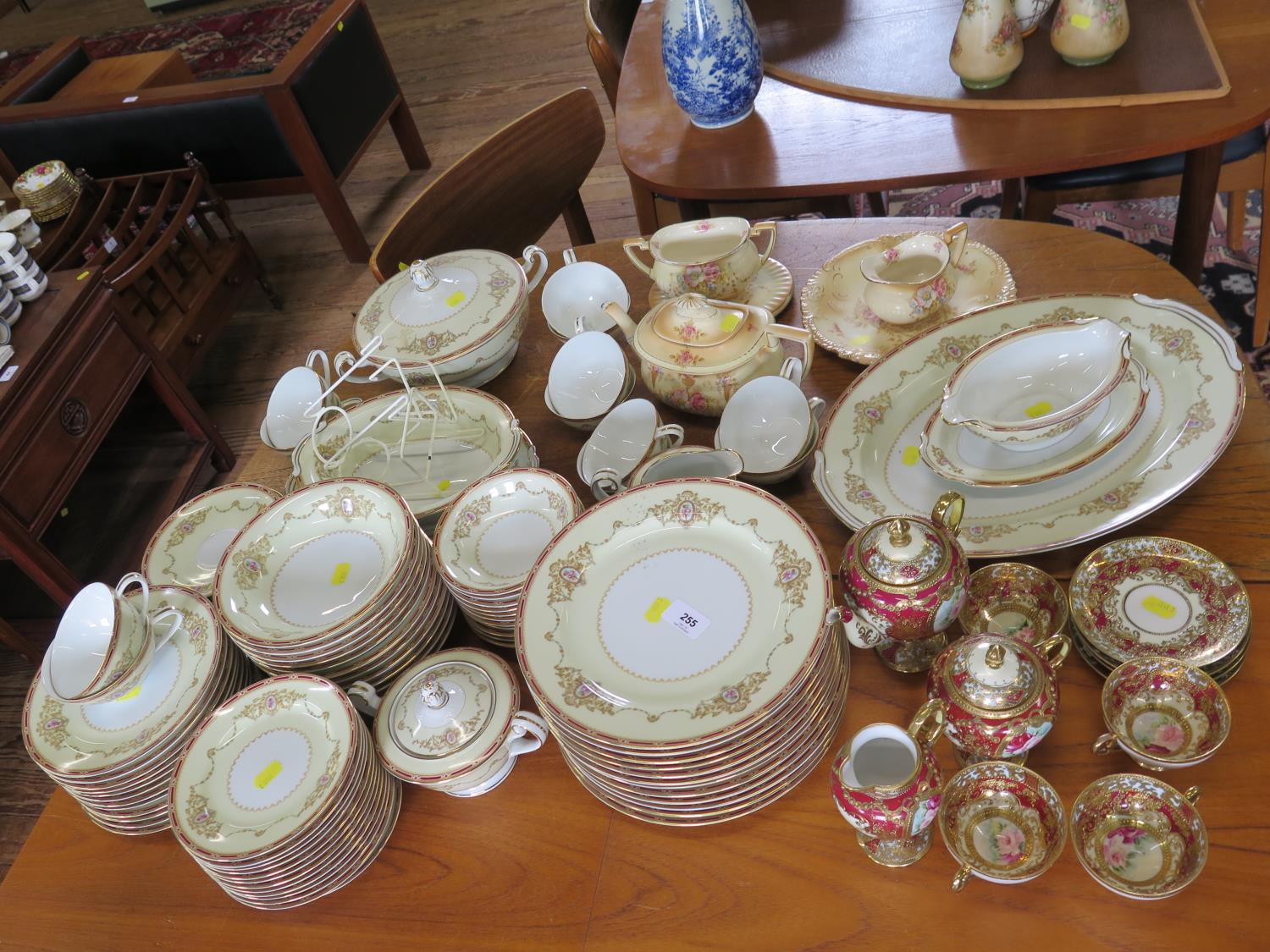 A Noritake dinner and breakfast service, for twelve place settings, a Viennese style cabinet