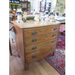 A Regency style mahogany bowfront chest of drawers, the ebony lined top over four long graduated