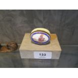 A 19th century Bilston type enamel patch box, the hinged lid depicting a ship and inscribed 'A