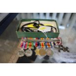 A set of World War I and II dress medals including a Military Cross and OBE