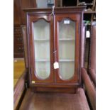 An Edwardian mahogany chequerbanded wall cabinet, with twin glazed doors over a shaped base, 45 cm