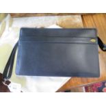 A Dunhill leather mens handbag, in black with fabric dust cover