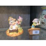 A Royal Doulton Snow White Grumpy's Bath Time together with Dopey by candle light models SN20 and
